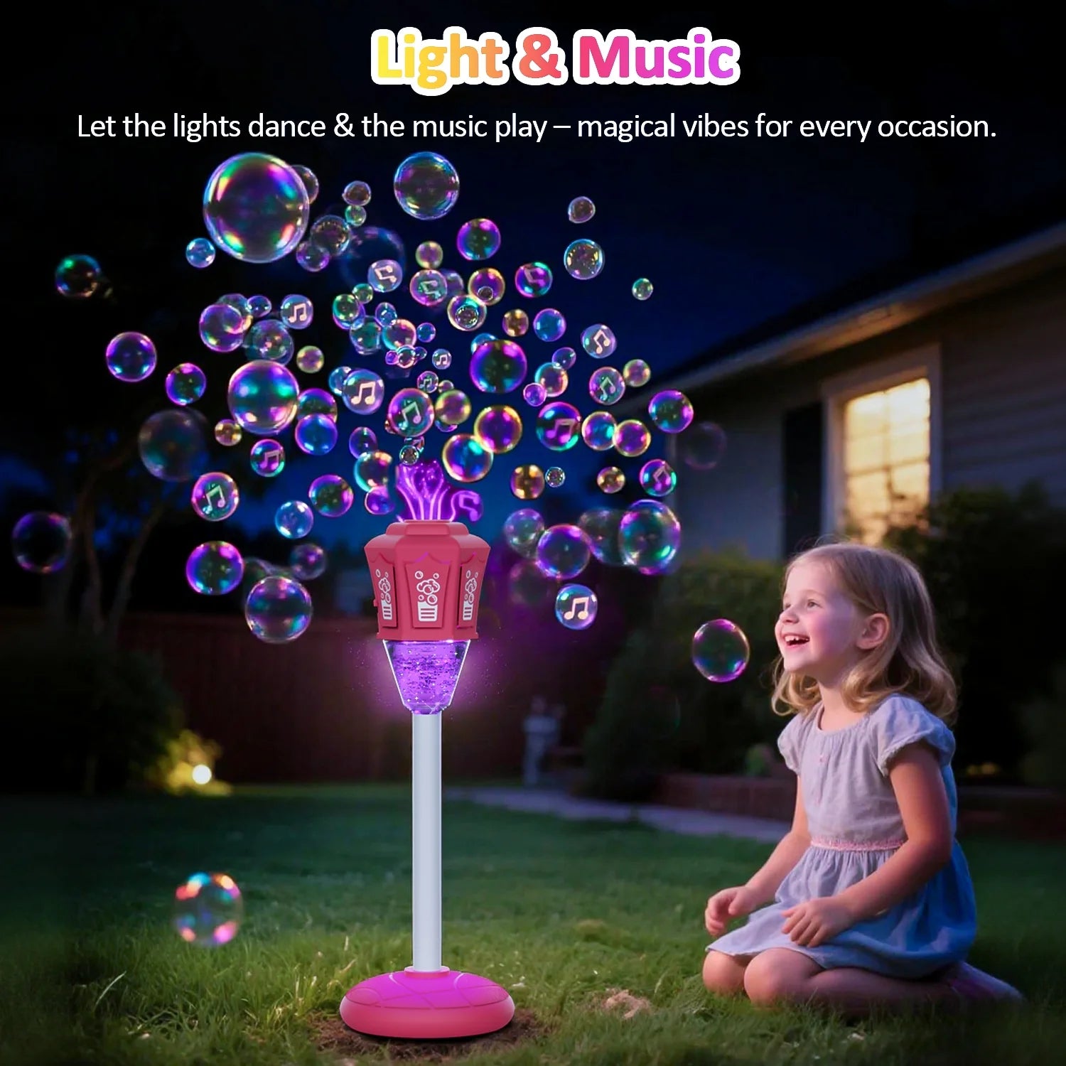 Child playing with a bubble machine that produces colorful bubbles at night.