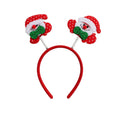 Red headband with two snowman figures with green glitter bow ties