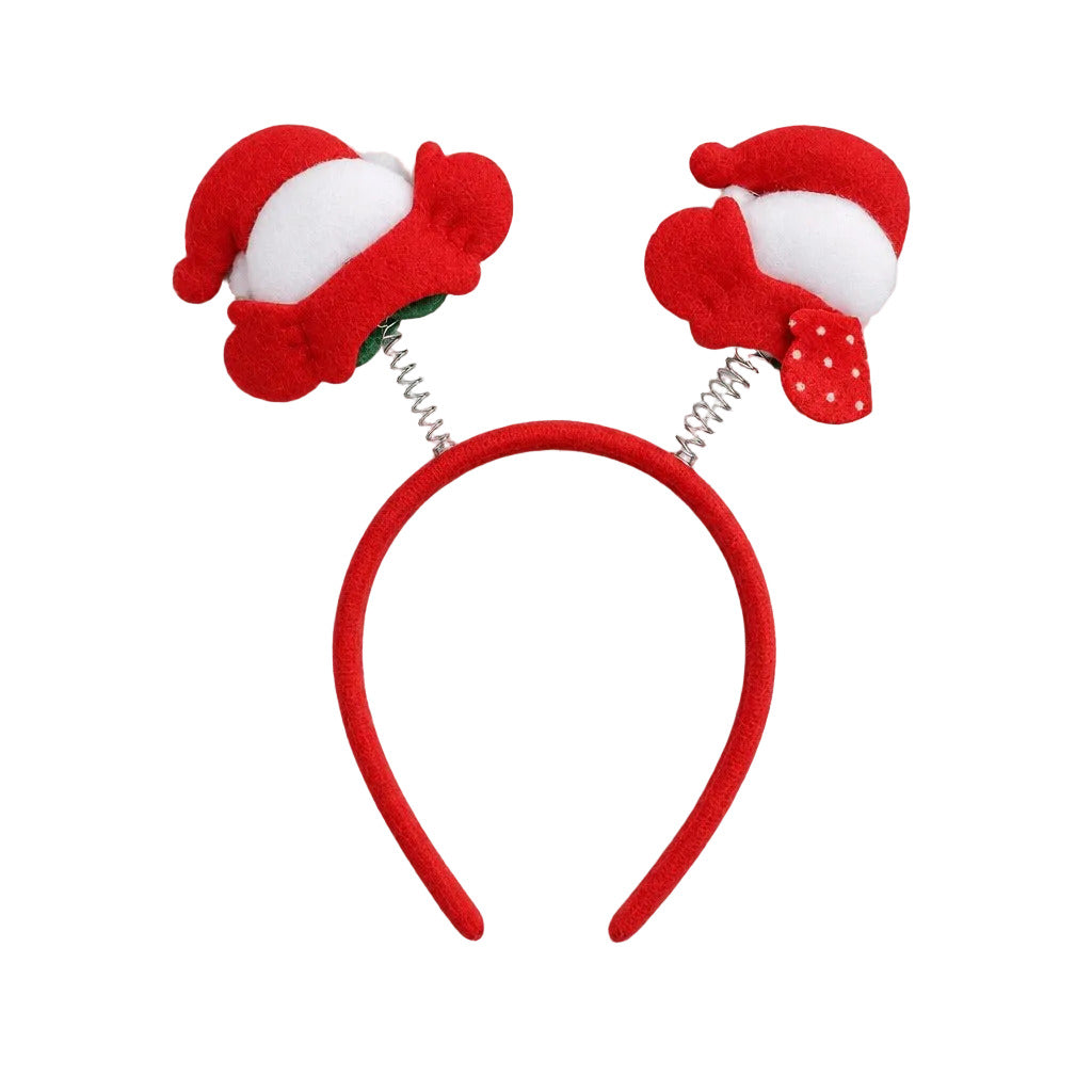 Red headband with two snowman figures with green glitter bow ties