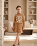 Brown & tan kids sweater and skirt set with diamond pattern and repeating logo