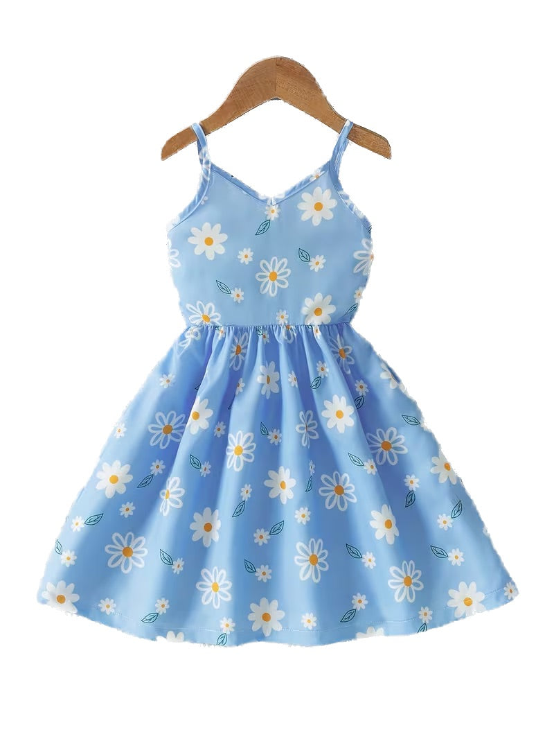 Blue dress with floral pattern on a hanger against a white background