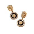 Gold lion head earrings with black centers and diamond-like stones on a beige fabric background Pair Of Drop Earrings Sparkling Inlaid Rhinestone Style