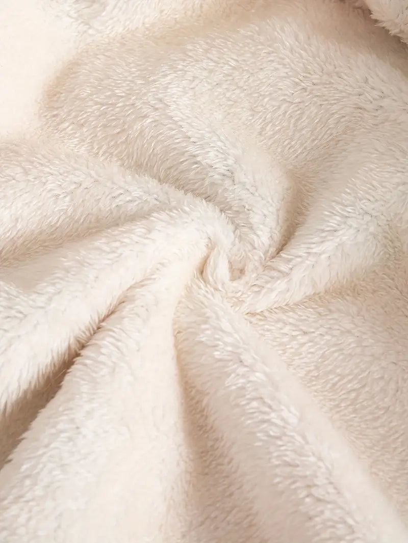 Close-up of beige fur texture