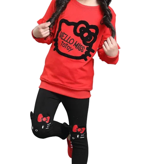 Red shirt and black pants with Hello Kitty design on a white background