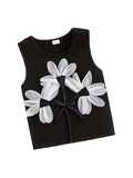 Black tank top with white floral designs on a white background