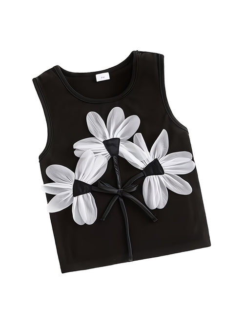 Black tank top with white floral designs on a white background