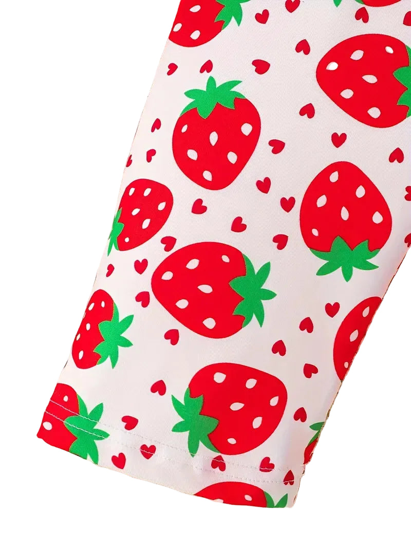 Leggings with red strawberry pattern on a white background
