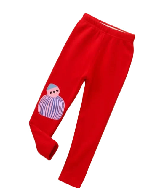 Red pants with a colorful character patch on a white background