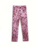 Pink velvet leggings on a white background 