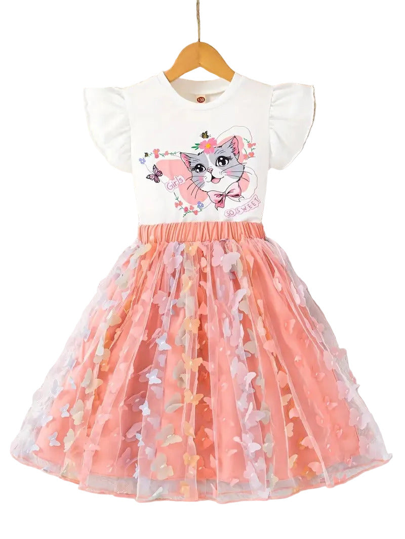Children's dress with cat design and pink tulle skirt on a white surface.