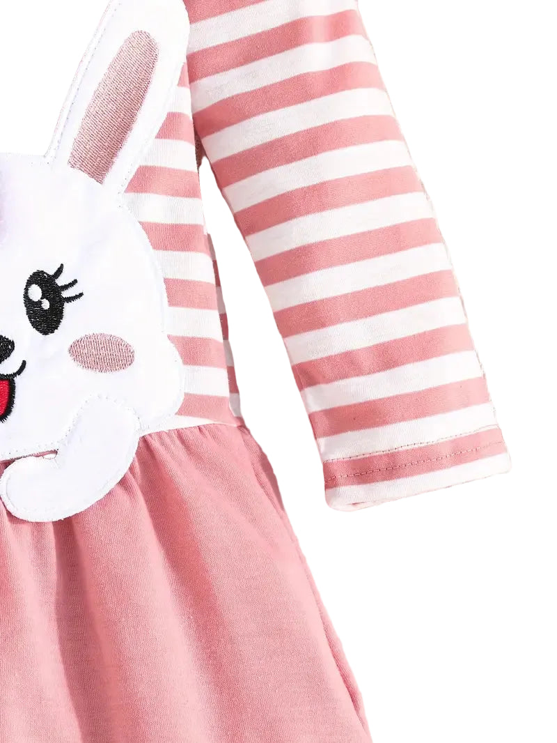 Pink dress with cartoon character and striped sleeves on a white background