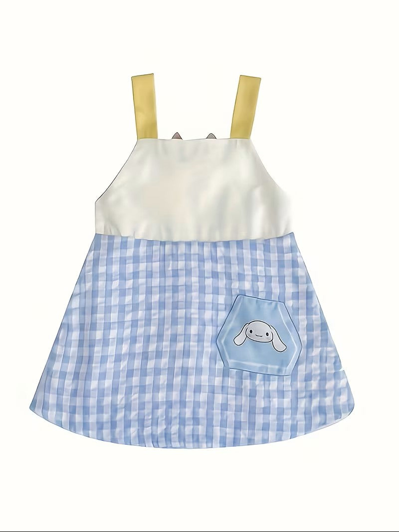 Children's dress with white top and blue checkered skirt on a white background