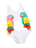 White swimsuit with colorful parrot designs on a white background