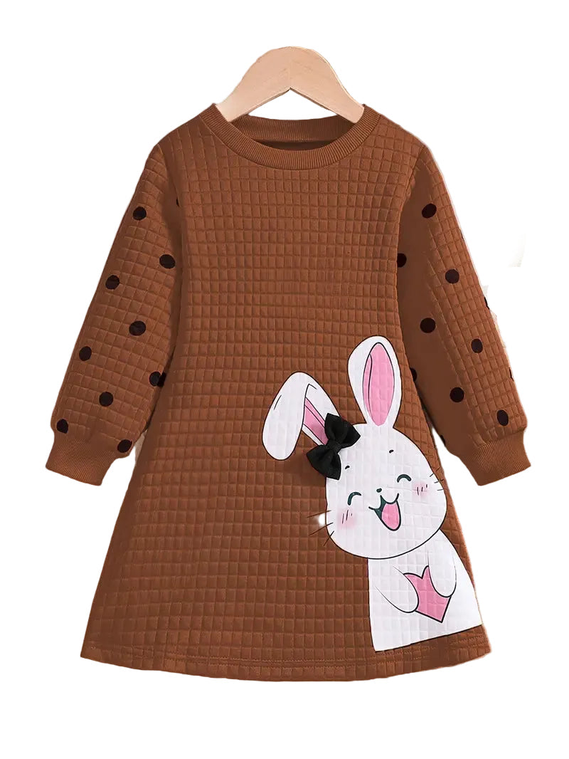 Brown dress with bunny design on a hanger against a white background