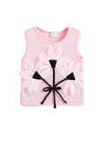 Pink sleeveless top with floral designs and black bows on a white background