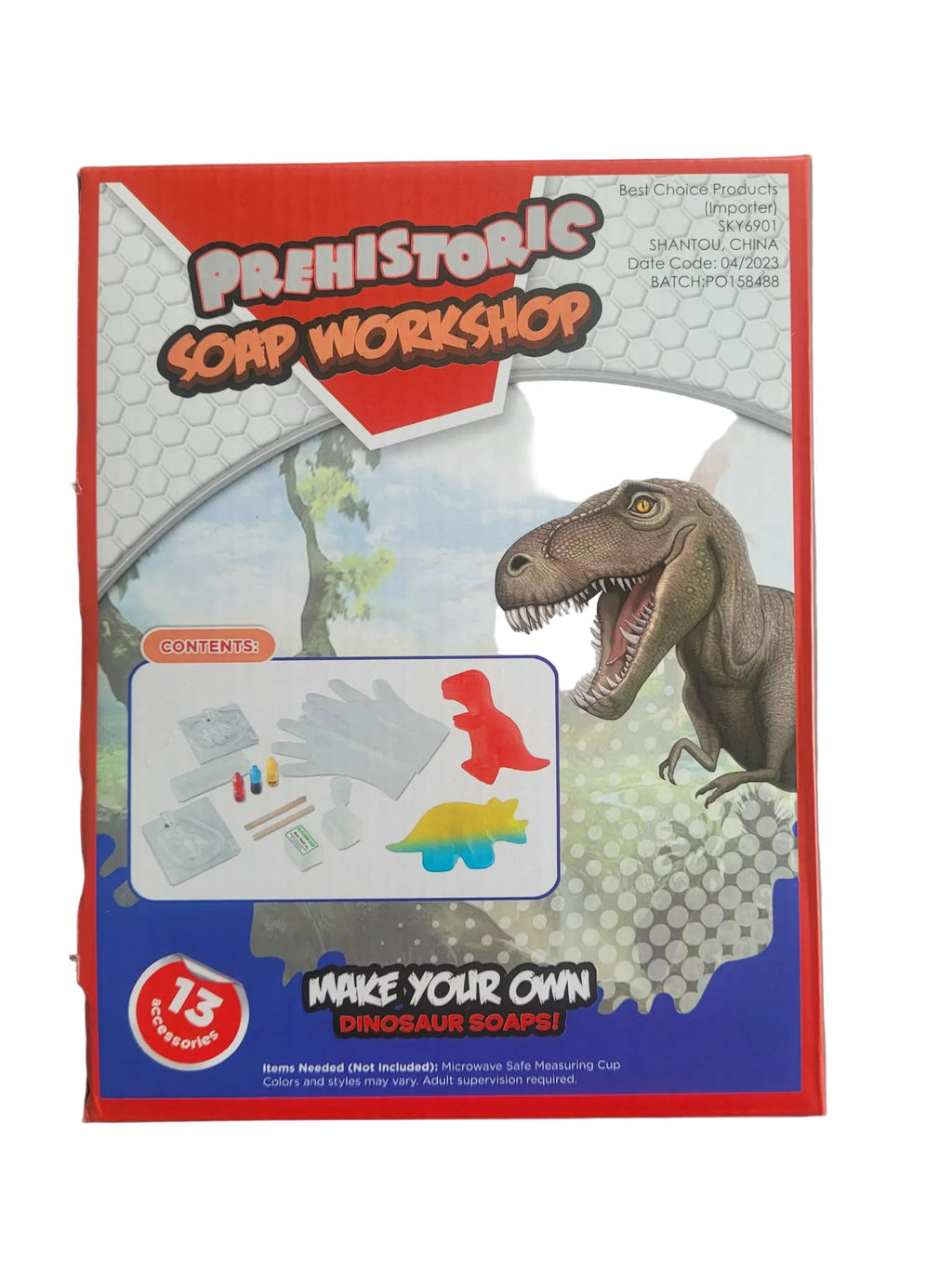 Packaging of a 'Prehistoric Soap Workshop' kit with a dinosaur design on a white background.