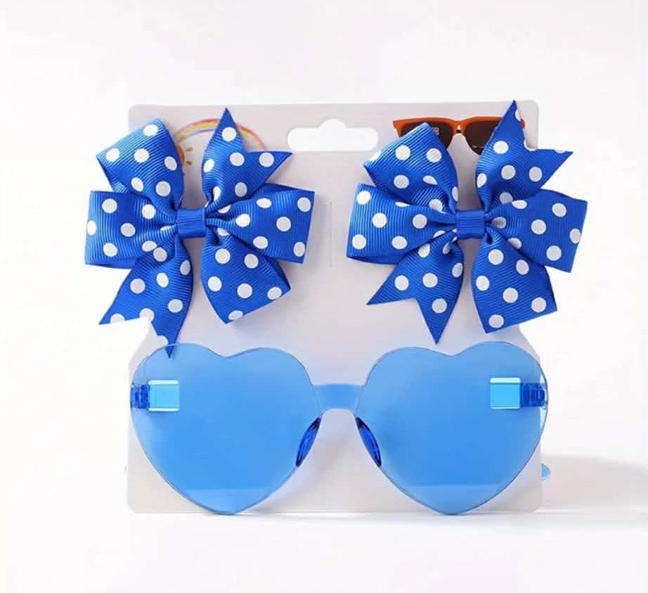 Blue heart-shaped sunglasses with blue polka dot bows on a white background