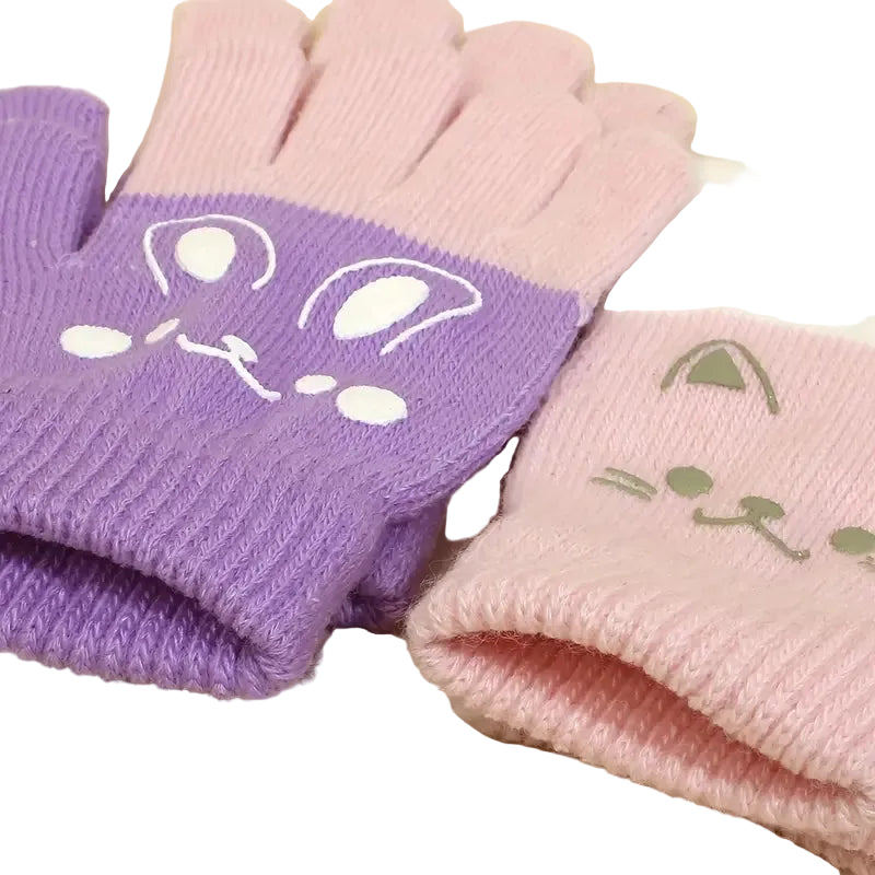 Pair of purple and pink gloves with cartoon designs on a beige background