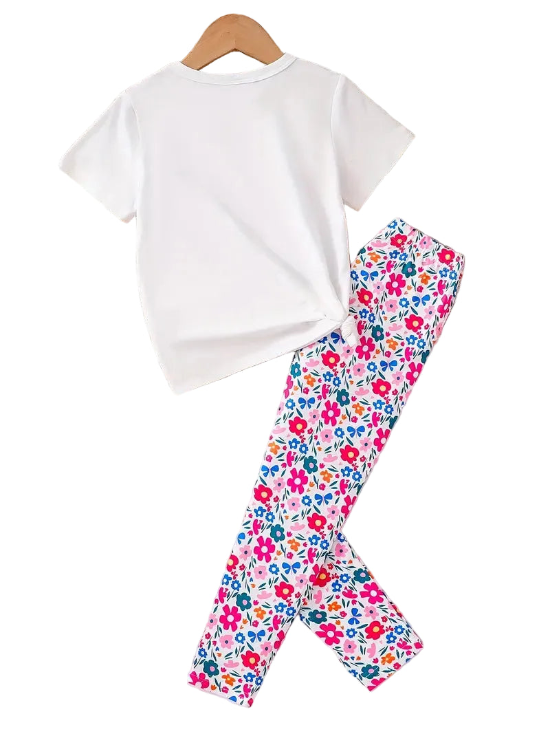 White t-shirt and colorful floral leggings on a white background