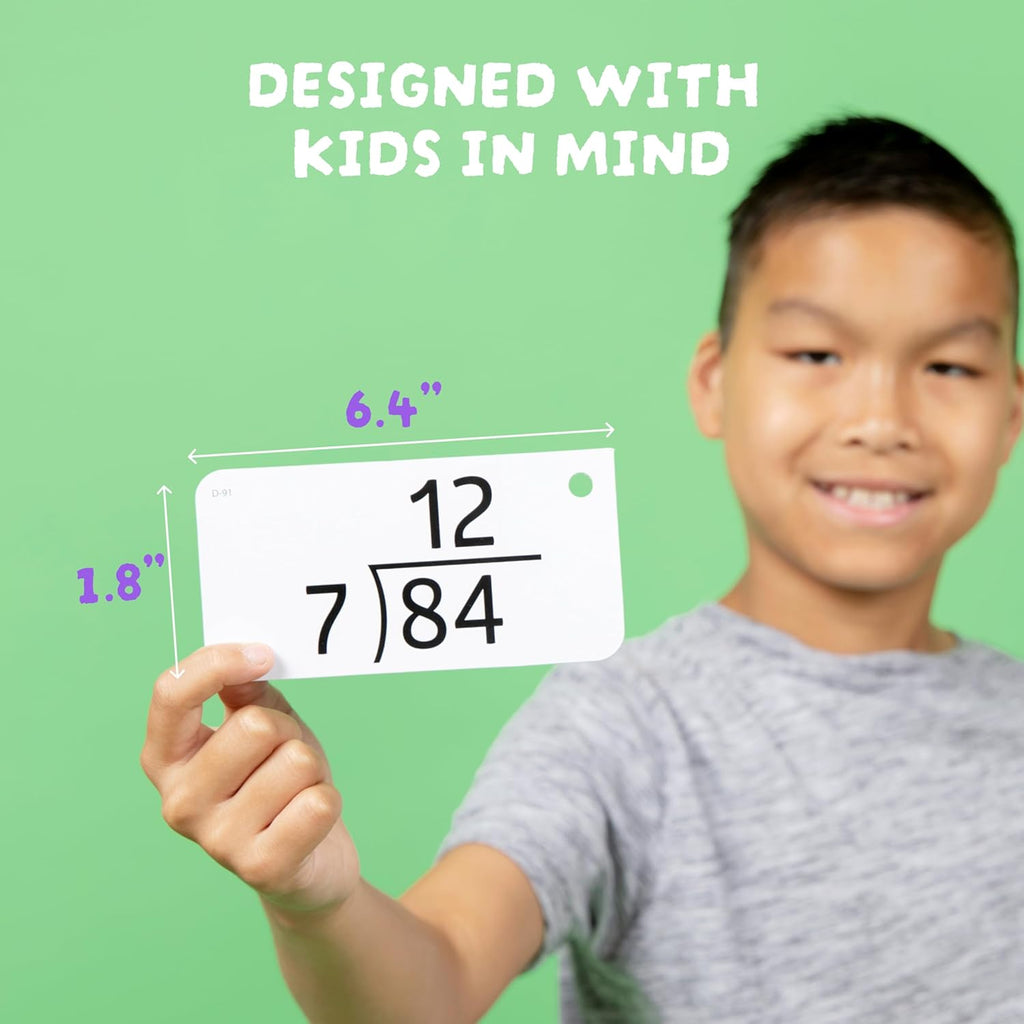 Child holding a math problem card with measurements on a green background
