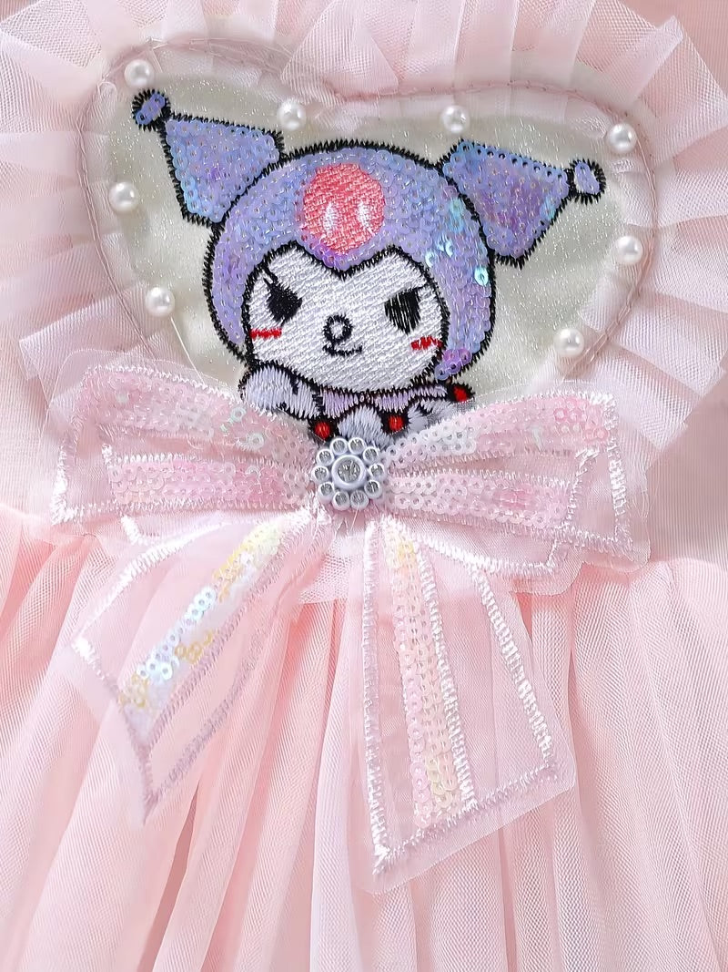 Embroidered patch with a cartoon character on a pink fabric background