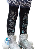 Black tights with snowflake patterns and silver boots on a white background