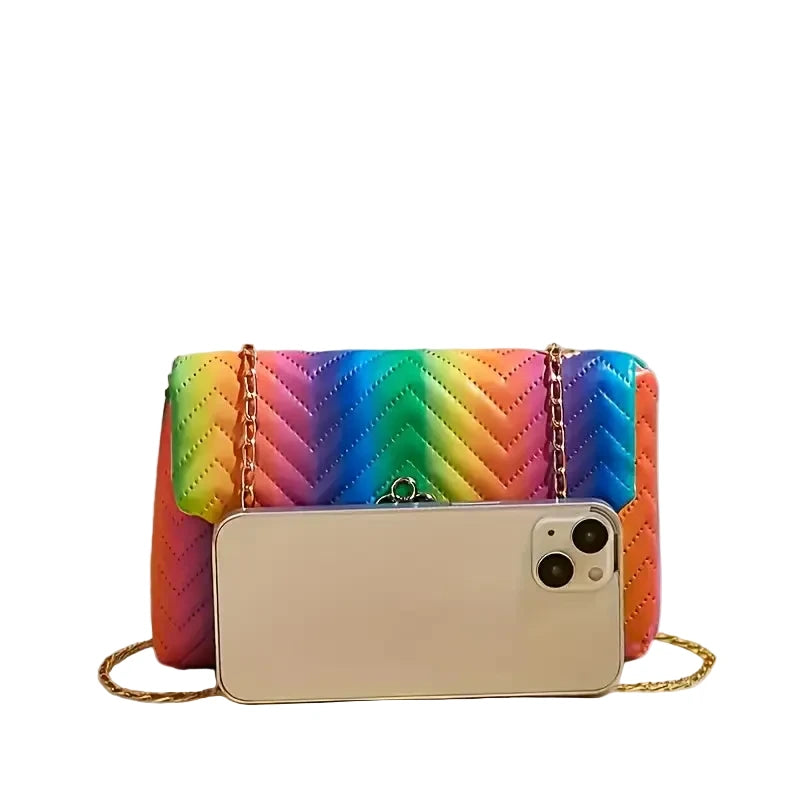 Beige phone case with gold chain on a gray background