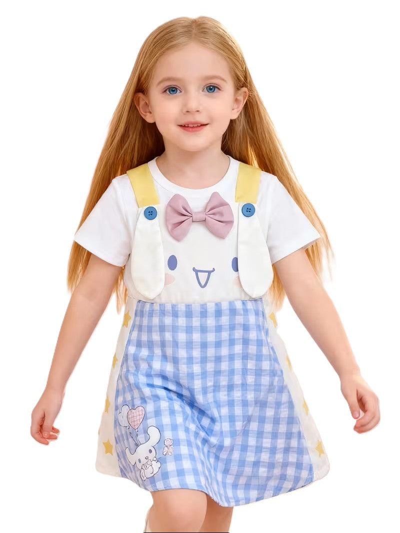 Young girl wearing a cute outfit with cartoon character design on a white background