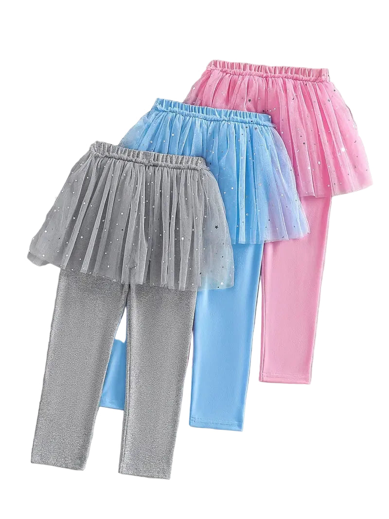 Three pairs of tulle leggings in gray, blue, and pink on a white background