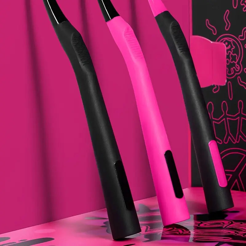 Three pink and black hair straighteners on a pink background with abstract designs.