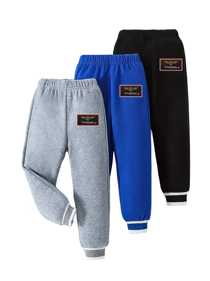 Three pairs of children's sweatpants in gray, blue, and black with a brand logo on a white background.
