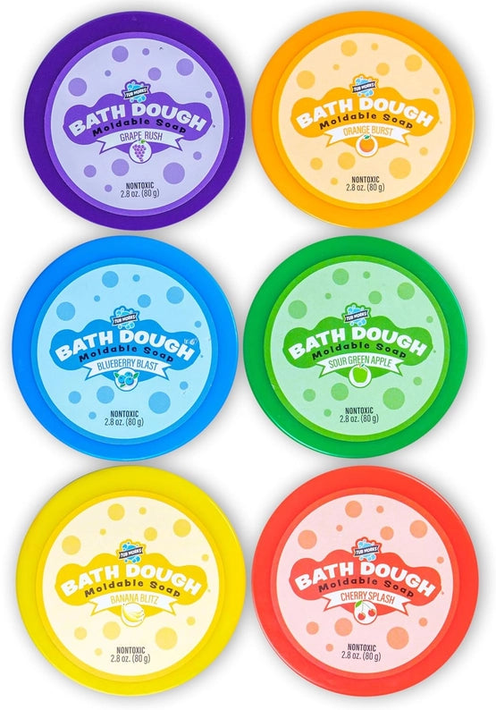 Set of six colorful containers of bath dough with different flavors on a white background.