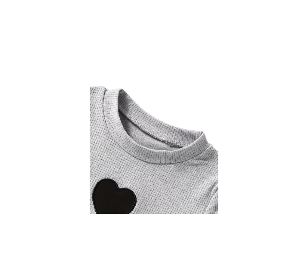 Gray sweater with a black heart design on a white background
