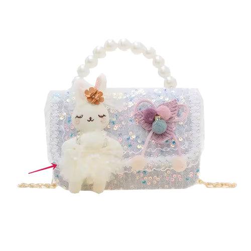 Children's handbag with a plush llama toy and decorative elements on a white background