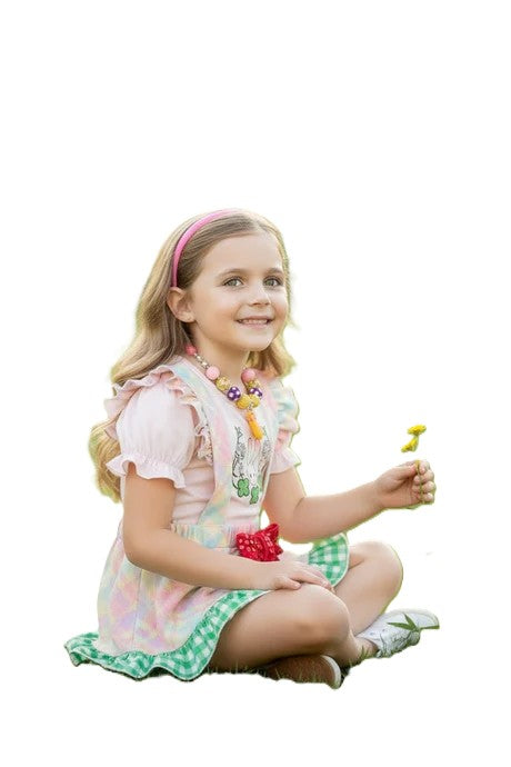 sitting girl in easter dress 