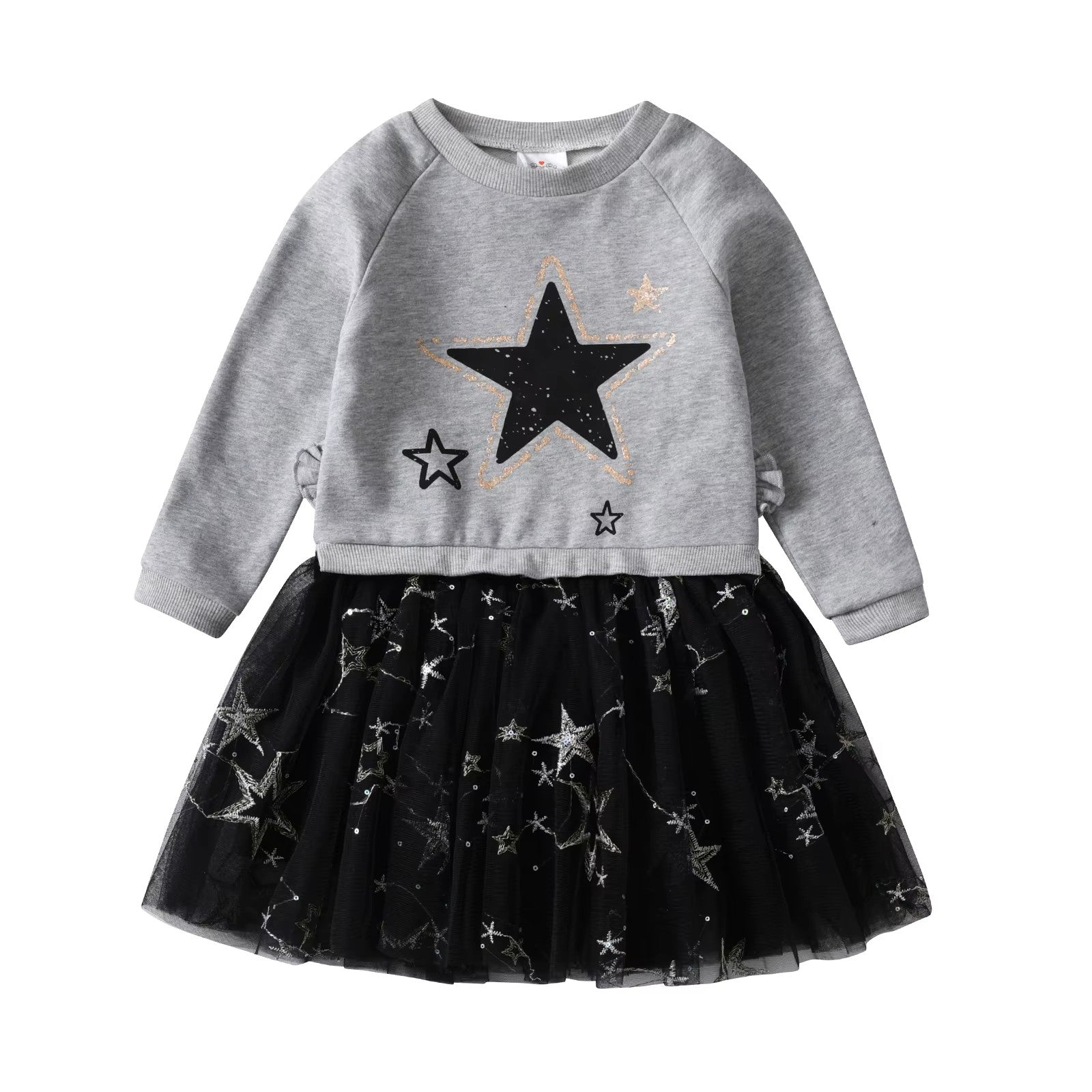 Children's outfit with gray sweater and black tulle skirt featuring star patterns on a white background.