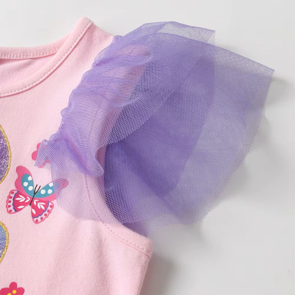 Pink outfit with a purple tulle skirt and butterfly designs on a light background