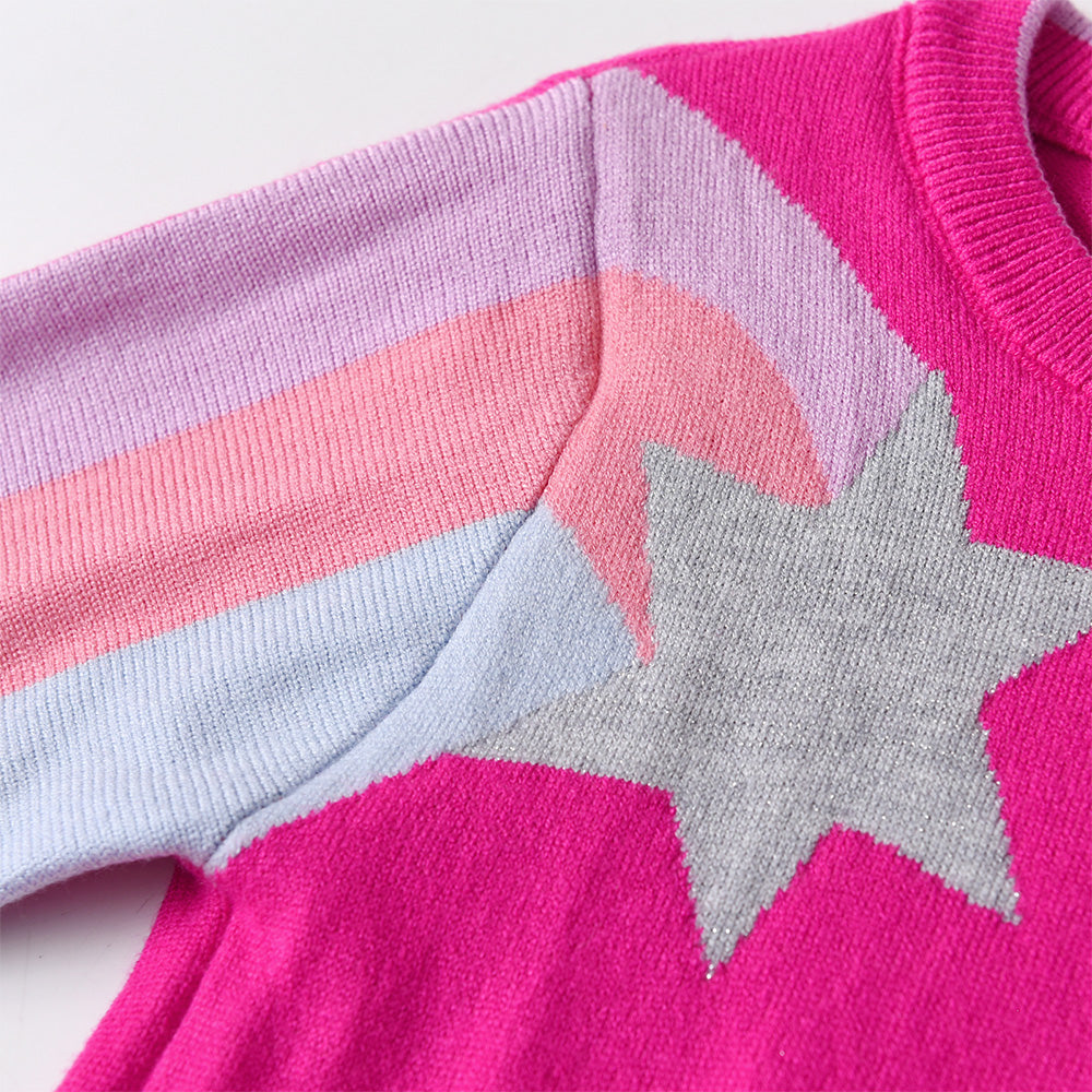 Close-up of a colorful sweater with star design on a light background