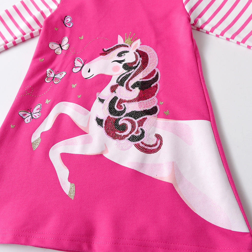 Pink dress with a unicorn design on a white background