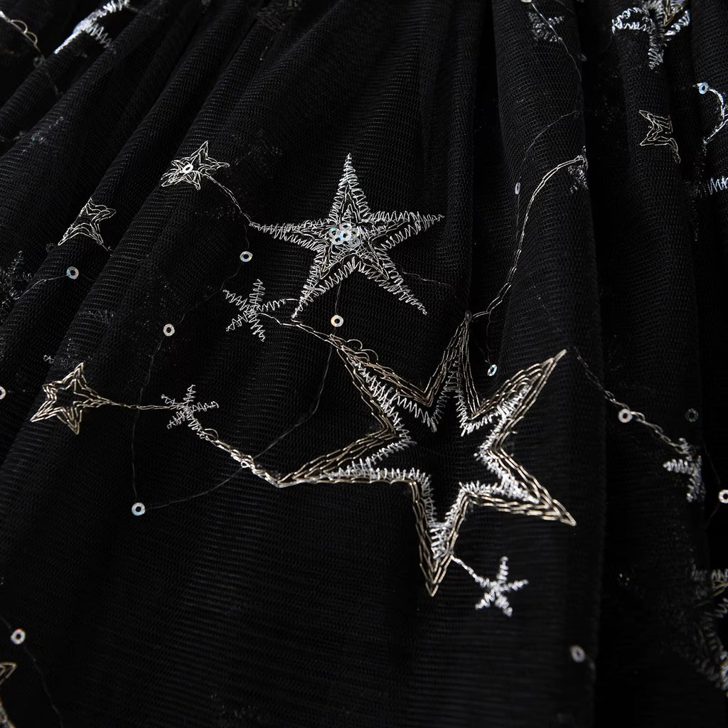 Black fabric with silver star embroidery