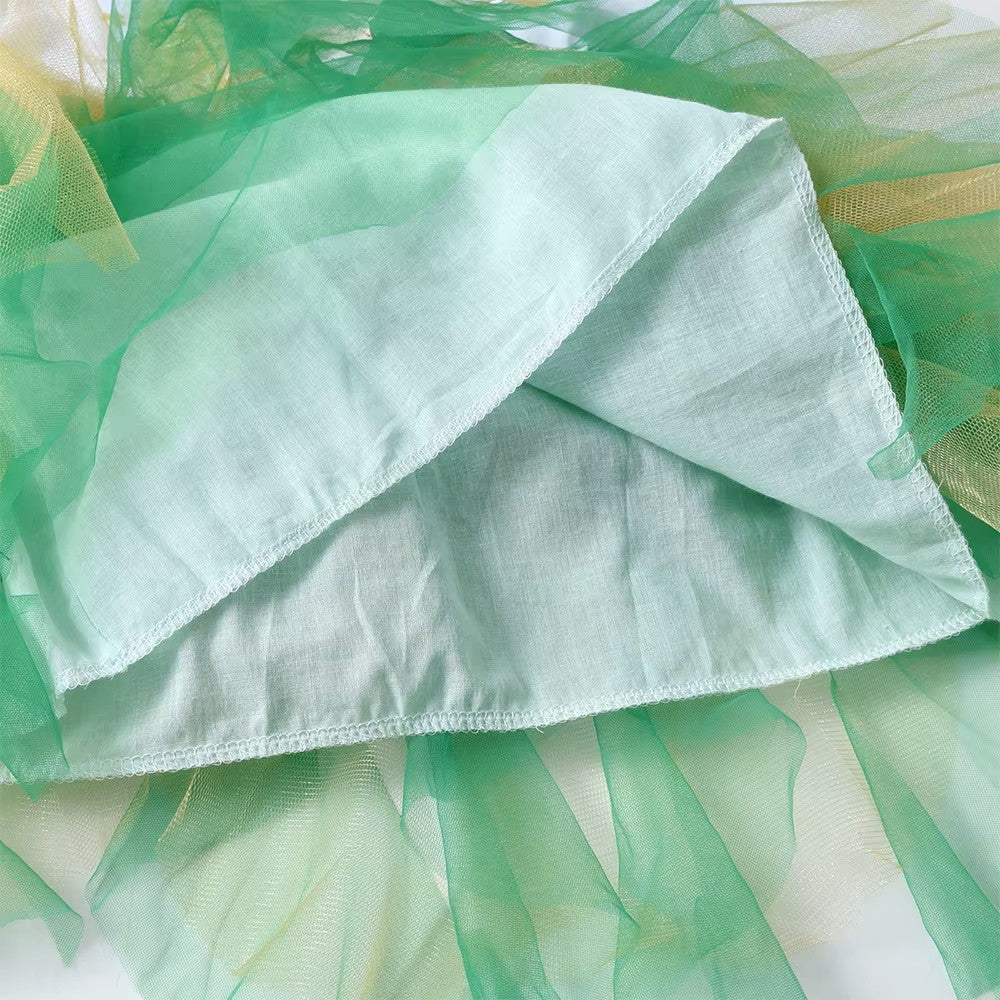 Light green fabric with sheer green overlay on a light background