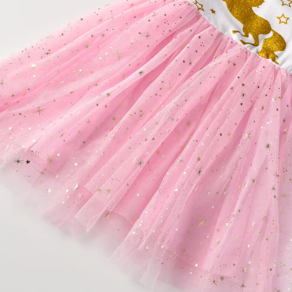 Pink tulle skirt with gold star sequins on a white background