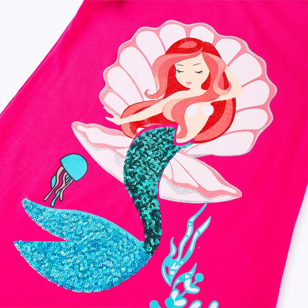 Mermaid design on a pink background with a shell and jellyfish.