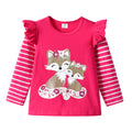 Pink children's shirt with fox design and ruffled sleeves on a white background