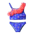 Two-piece swimsuit with starfish pattern and pink floral accents on a white background