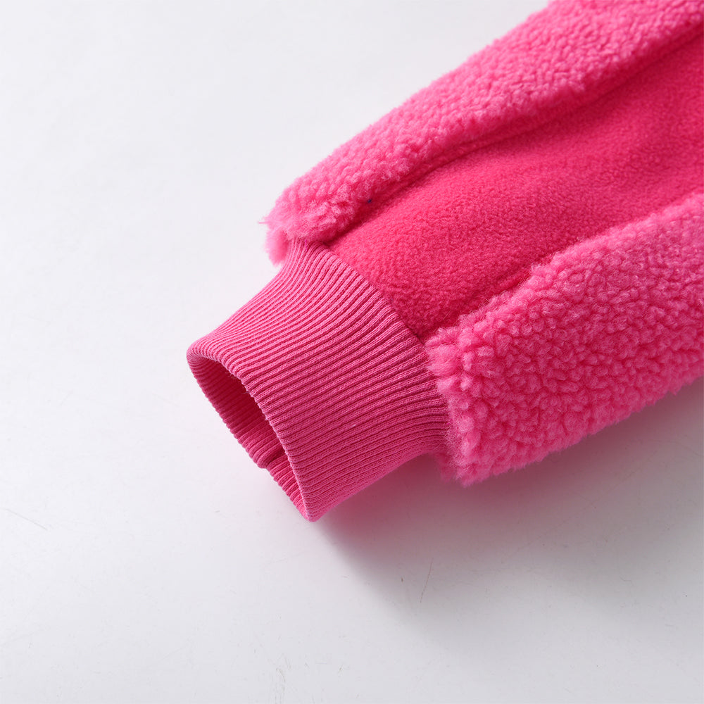 Close-up of a pink fleece glove on a white background