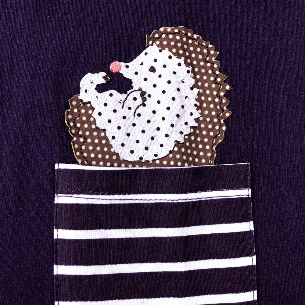 Navy blue shirt with a hedgehog design on the pocket