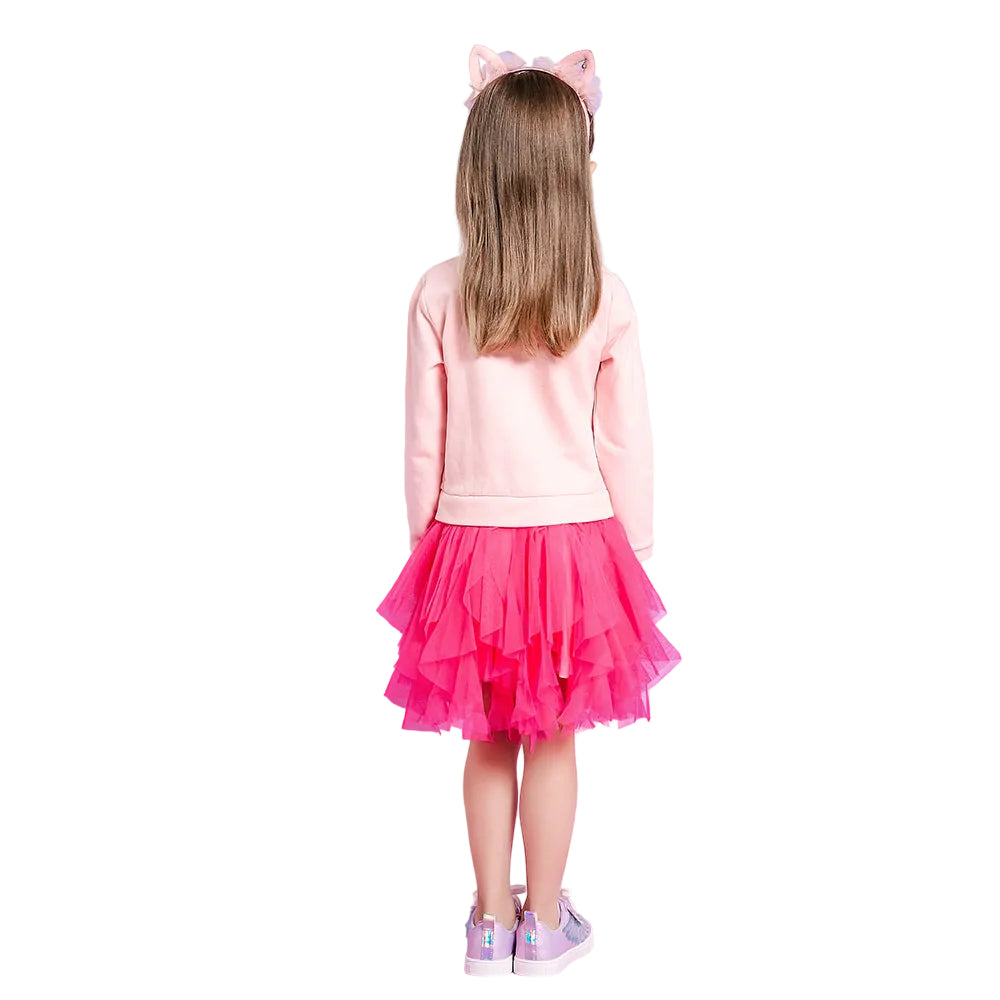 Child wearing a pink top and pink tutu skirt with cat ears on a white background