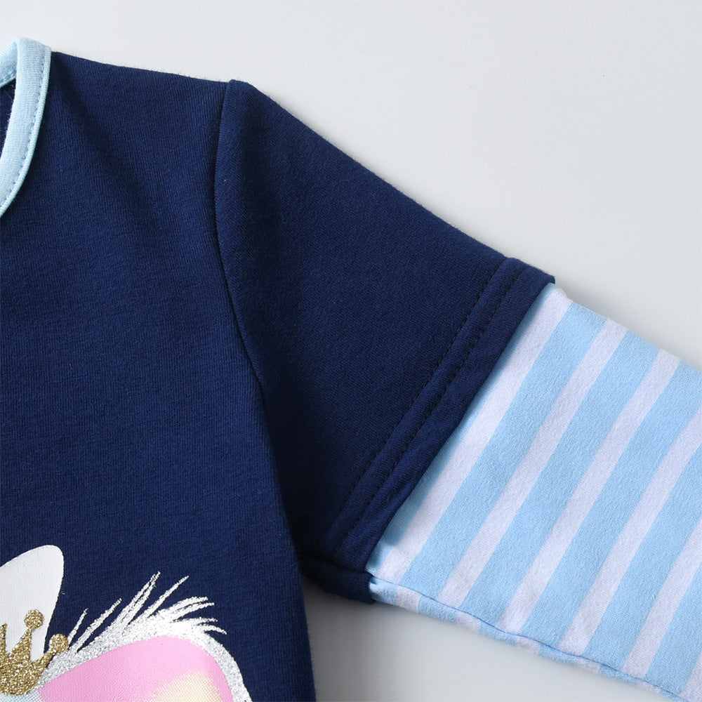 Navy blue sleeve with light blue and white striped cuffs on a plain background