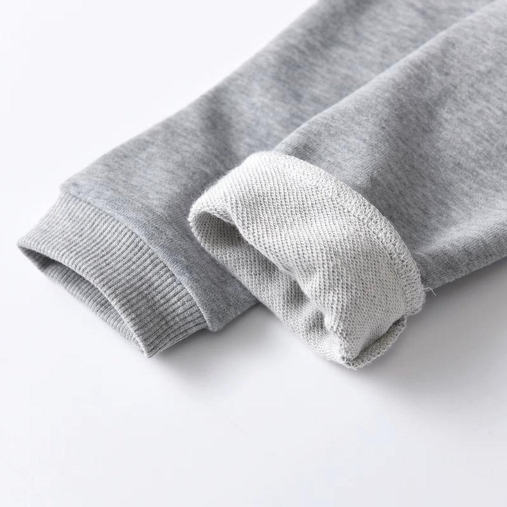 Close-up of gray knit fabric on a white background